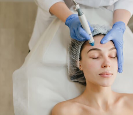 view from above of beautiful woman enjoying cosmetology procedures, rejuvenation in beauty salon. dermatology, doctor at work, healthcare, therapy, botox. place for text.
